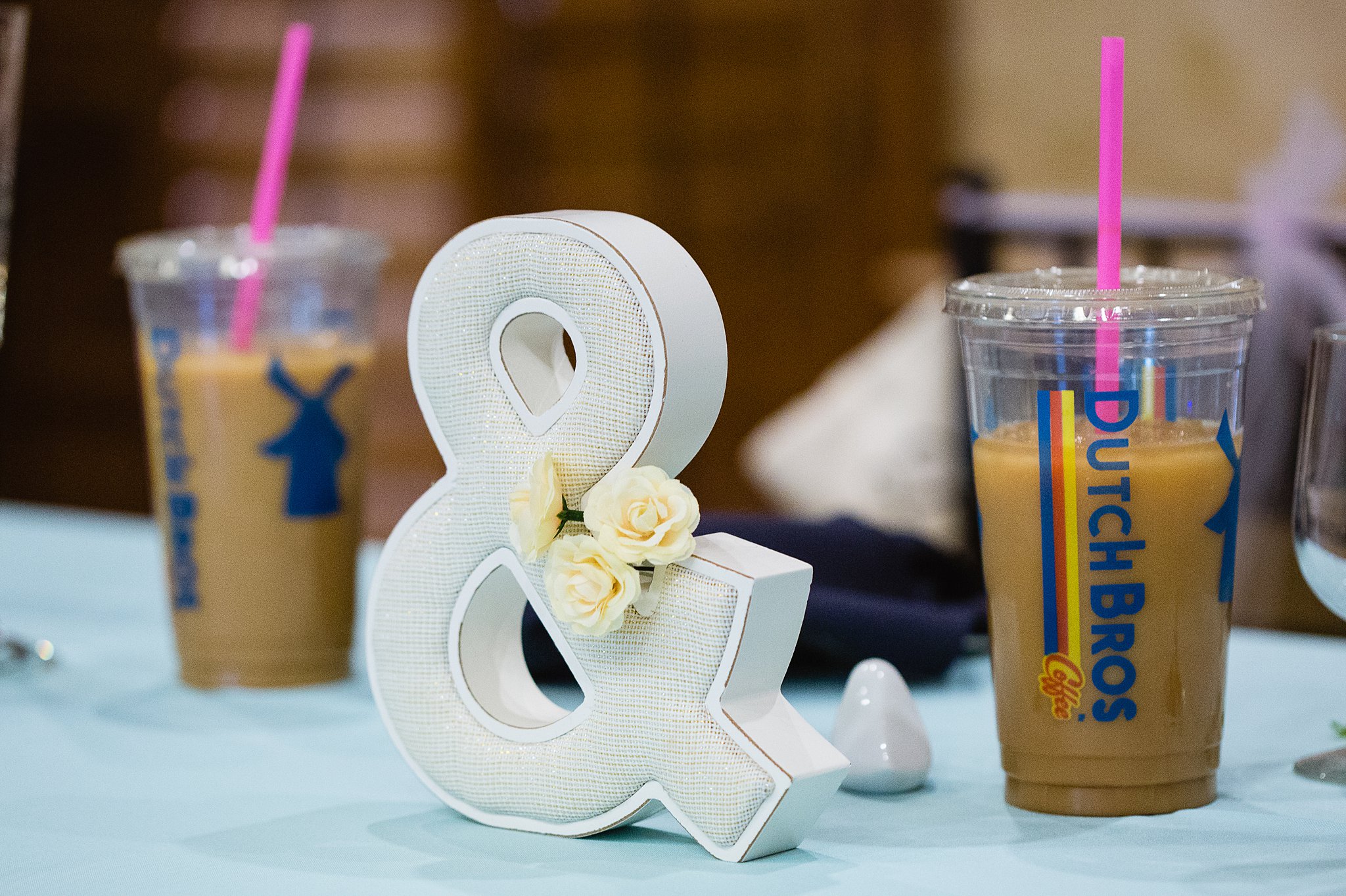 Bride and groom's Dutch Bro's coffee at their wedding reception by PMA Photography.
