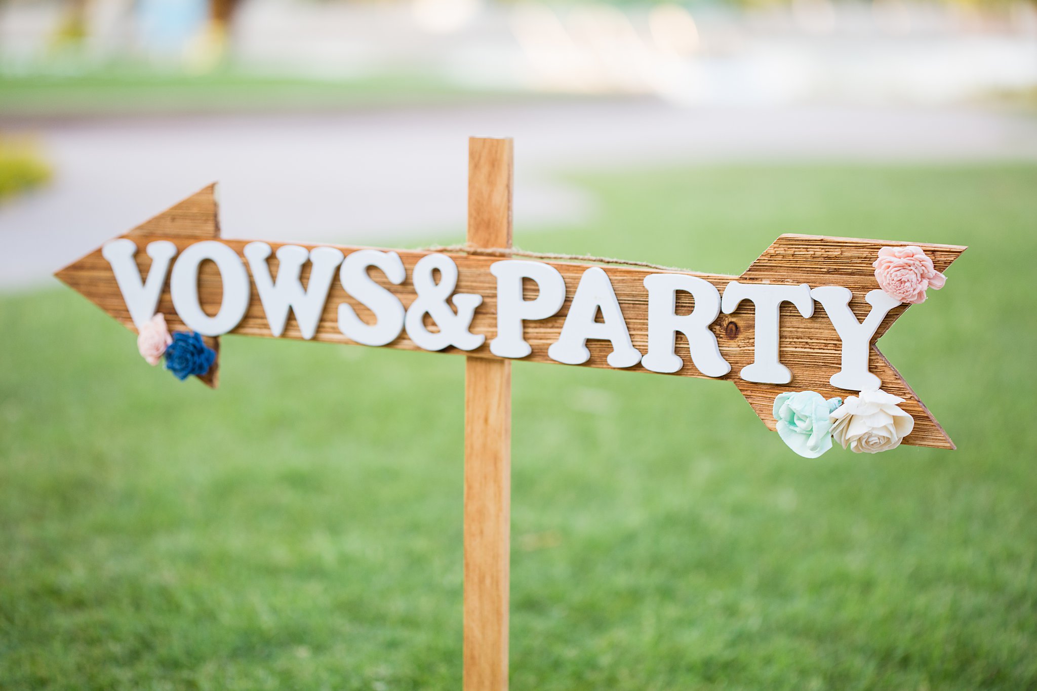 Wedding ceremony Vows & Party wooden sign at Val Vista Lakes by Arizona wedding photographer PMA Photography.
