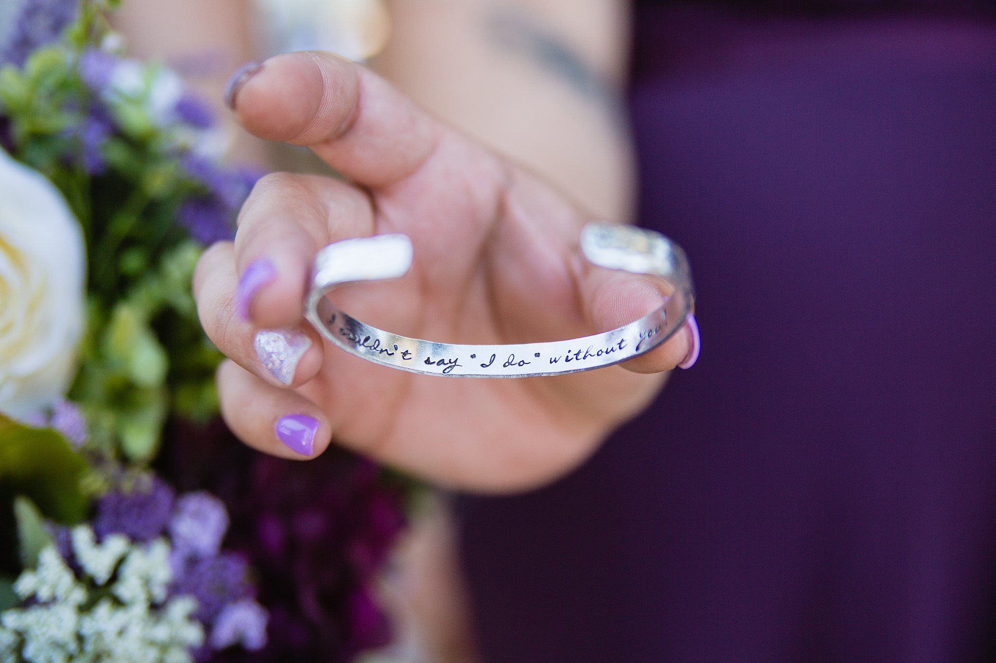 Bridesmaids gift bracelet "I couldn't say I do without you" by wedding photographer PMA Photography.