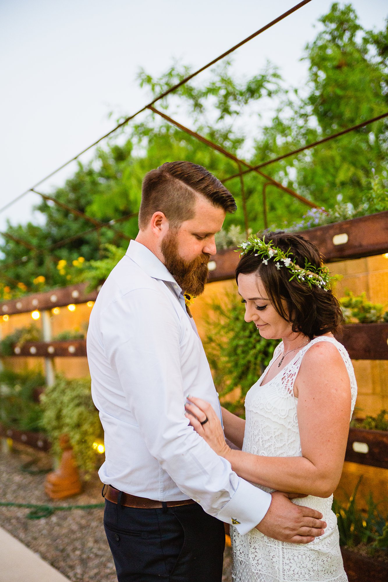 Simple boho inspired bride and groom at their intimate backyard garden wedding by Arizona wedding photographer PMA Photography.