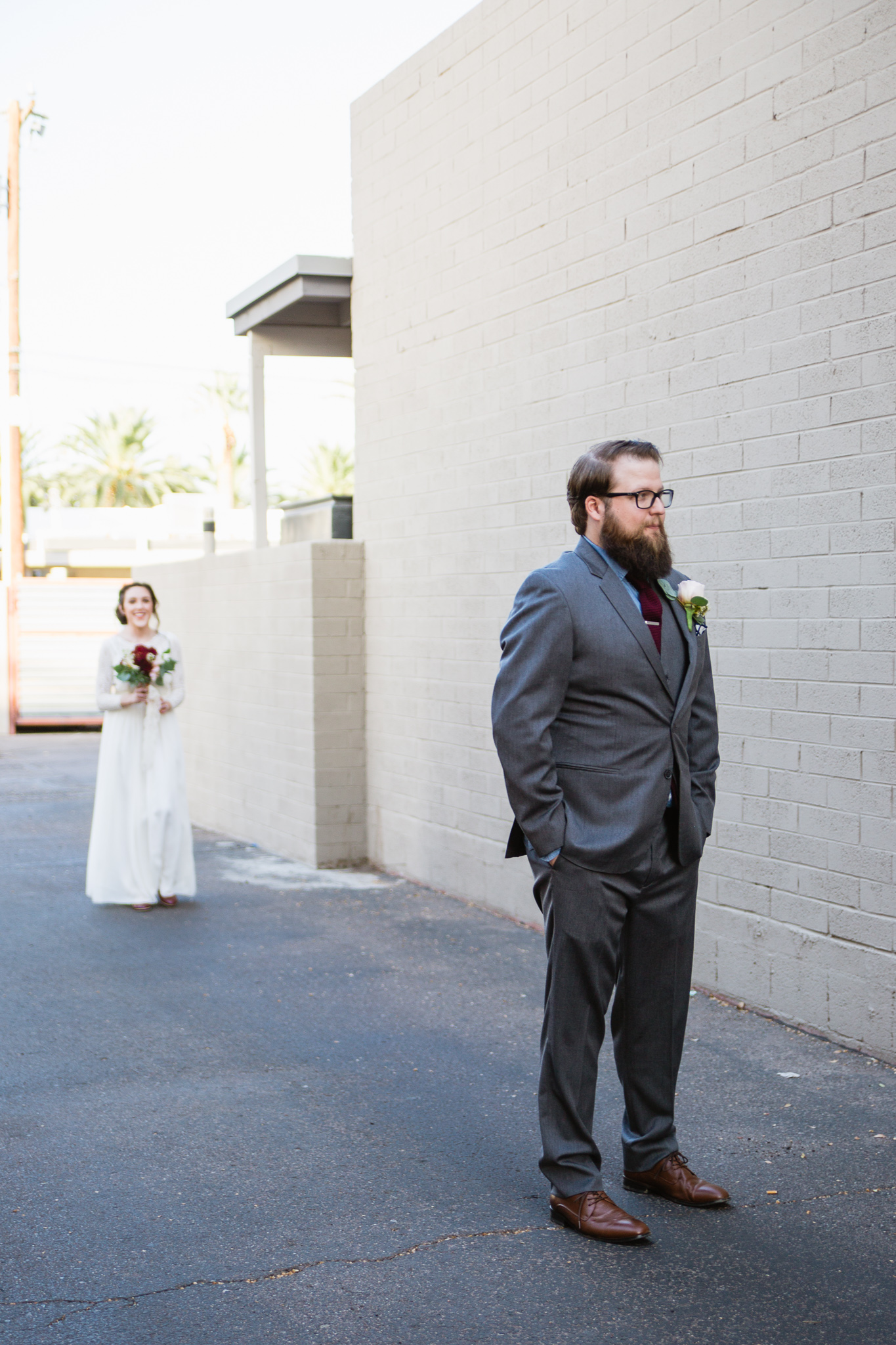 Bride and groom getting ready for their first look in downtown Phoenix.