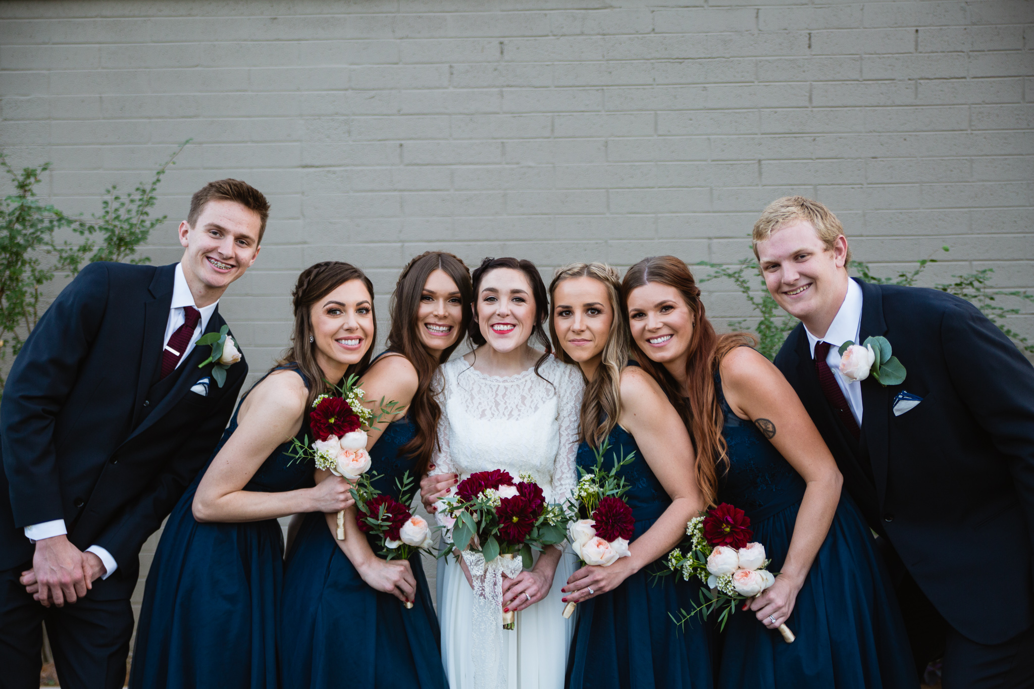 Vintage themed maroon and navy bridal party. Bride with her mixed gender bridal party.