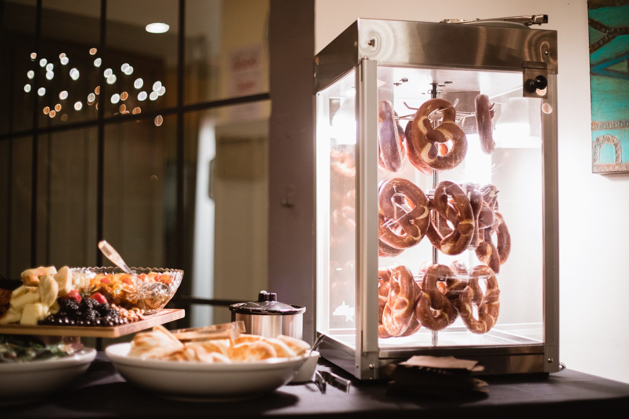 Hors d'oeuvres at a wedding reception with fresh pretzels in a pretzel warmer.