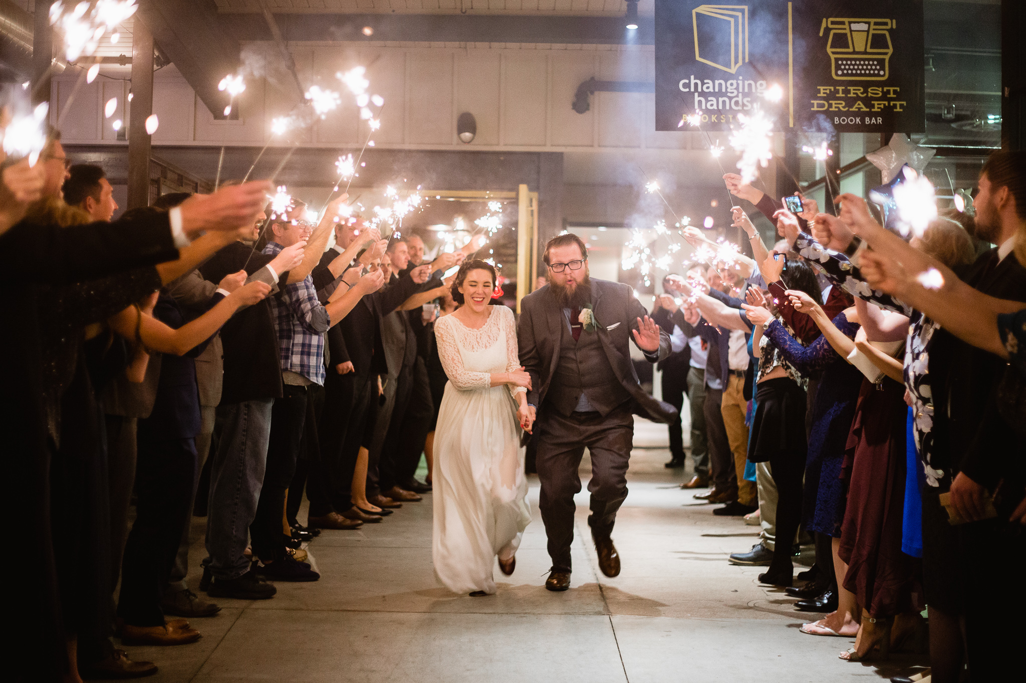 Bride and Groom Wedding Sparkler Exit at their wedding at The Newton by Phoenix wedding photographers PMA Photography.
