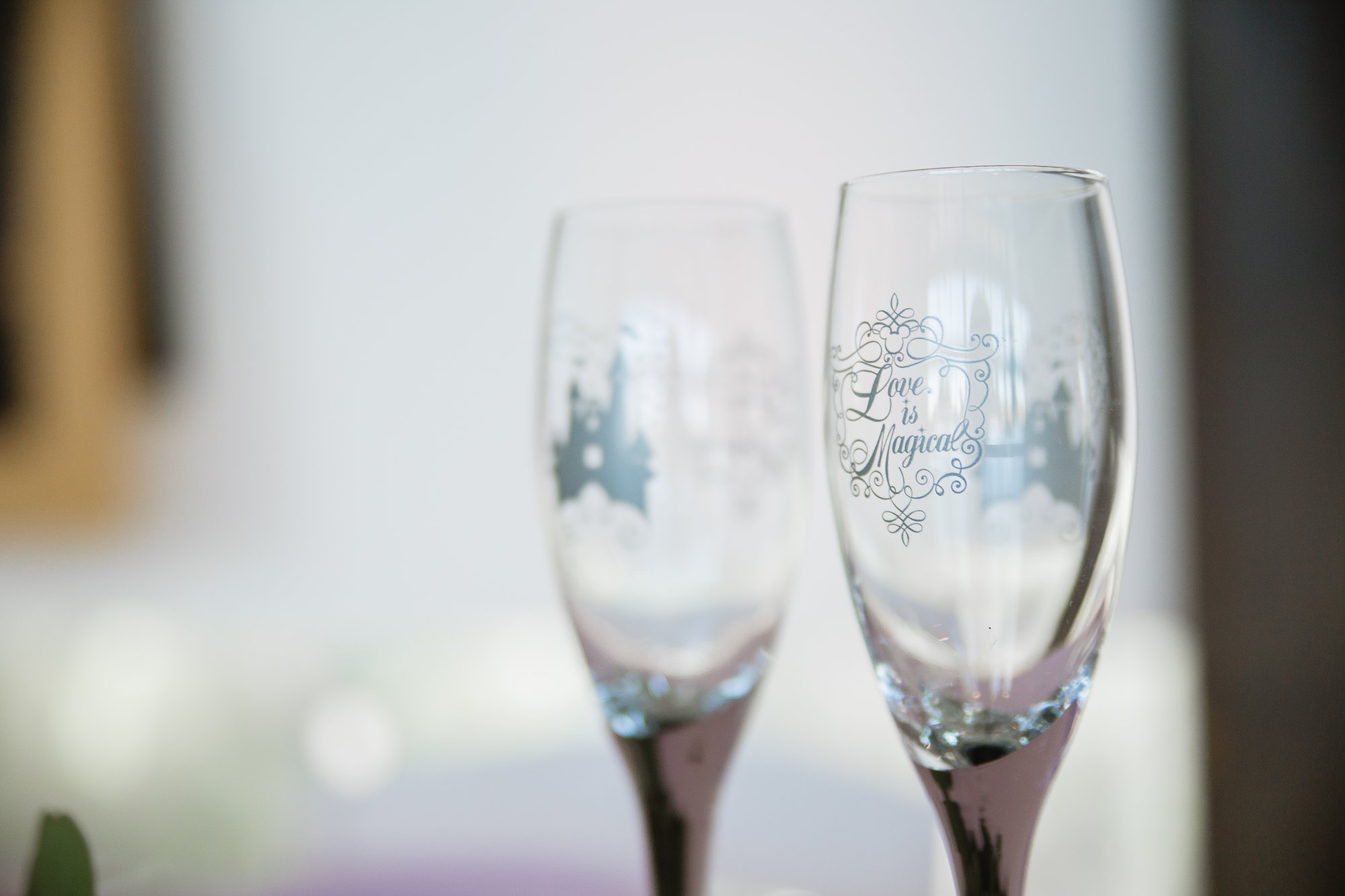 Disney wedding champagne glasses for the bride and groom.