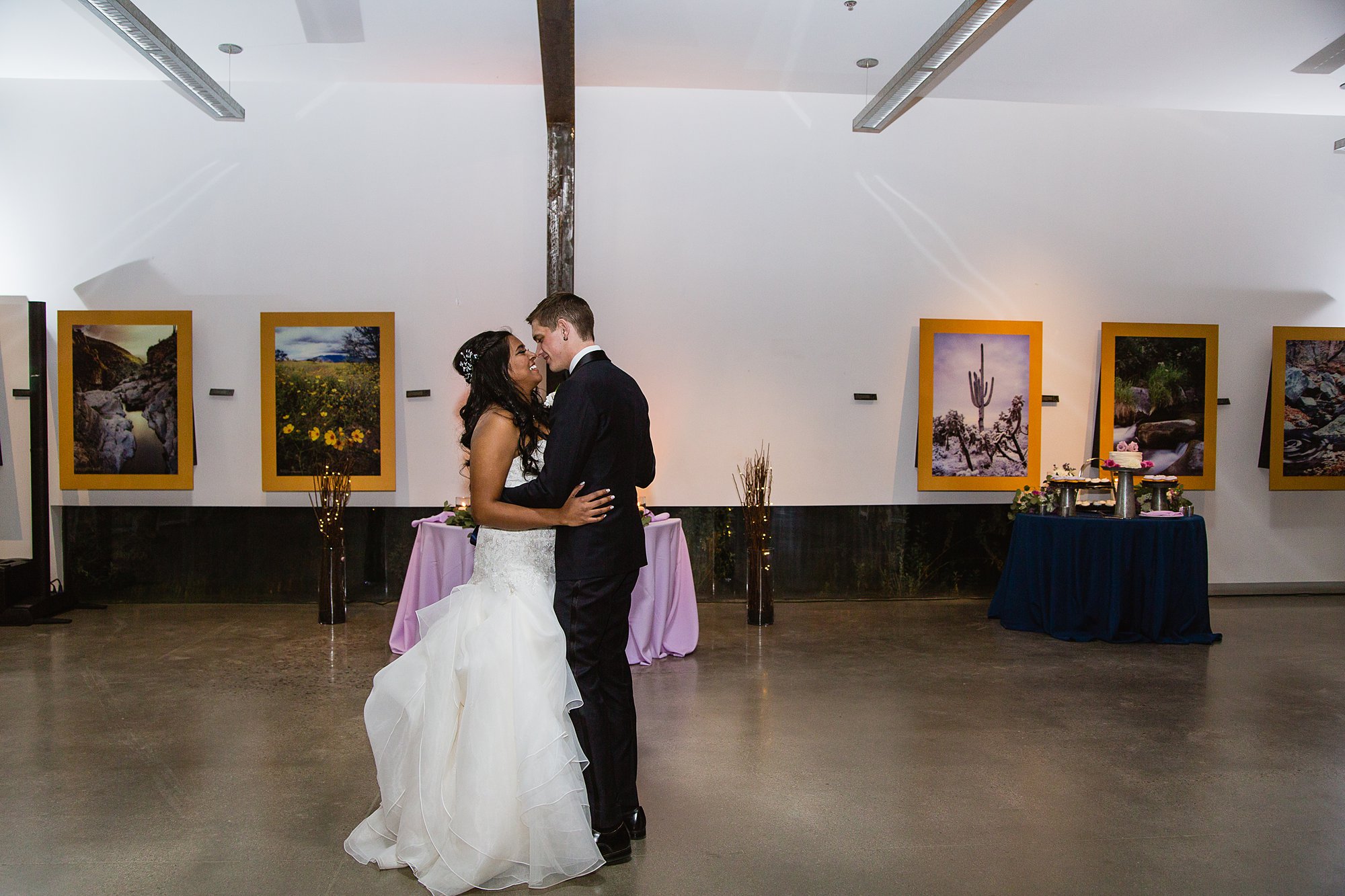 Bride and groom share their first dance at the Rio Salado Audubon center by Phoenix wedding photographer PMA Photography.