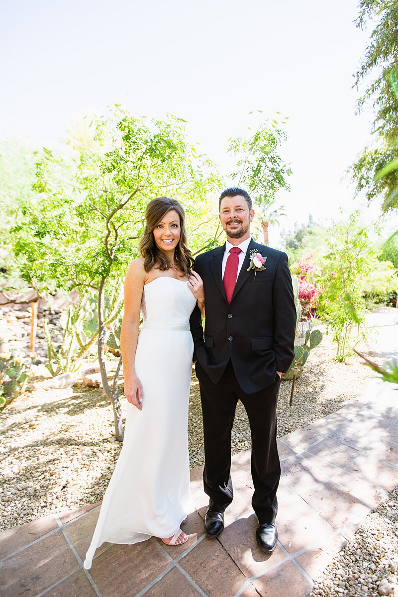 Classic bride and groom in an Arizona desert garden by wedding photographer PMA Photography.