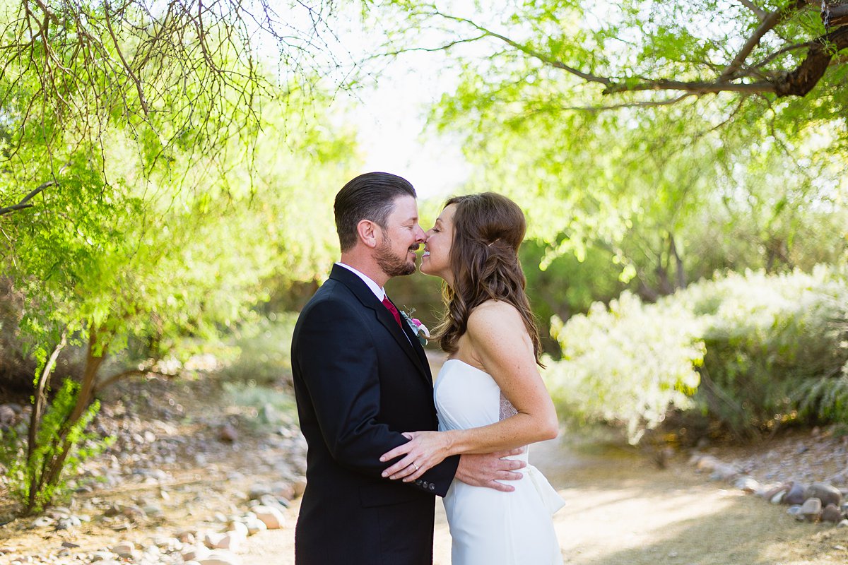 Bride and groom sharing an intimate moment at their Hermosa Inn wedding by Phoenix wedding photographer PMA Photography.