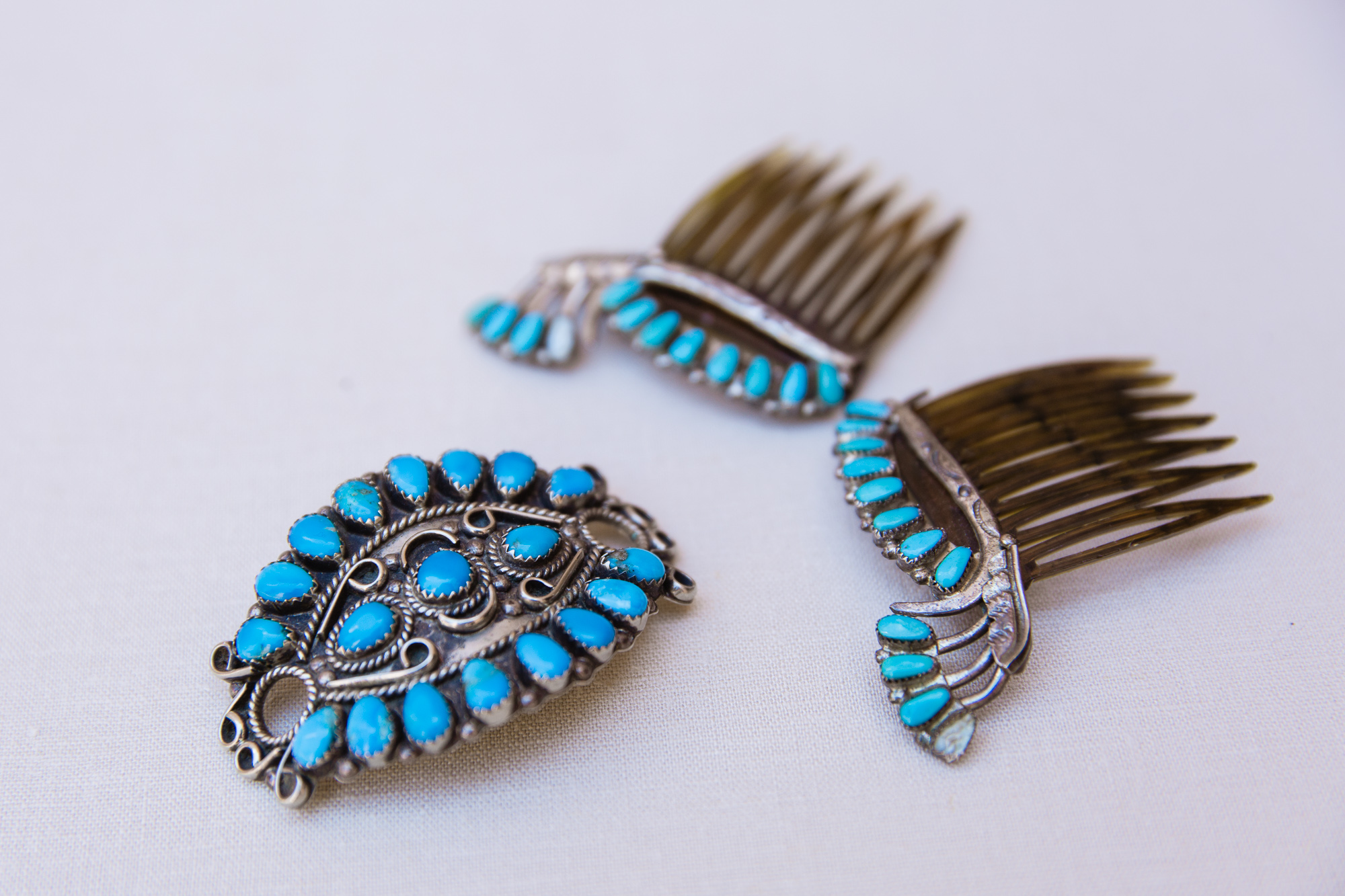 Turquoise hair pieces for the Navajo bride at her wedding by Arizona wedding photographer PMA Photography.