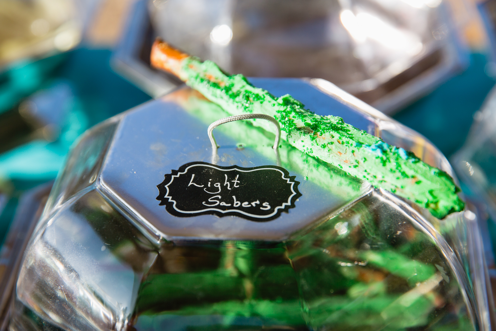 Star Wars themed snack table featuring Light Sabers for cocktail hour by Arizona wedding photographer PMA Photography.