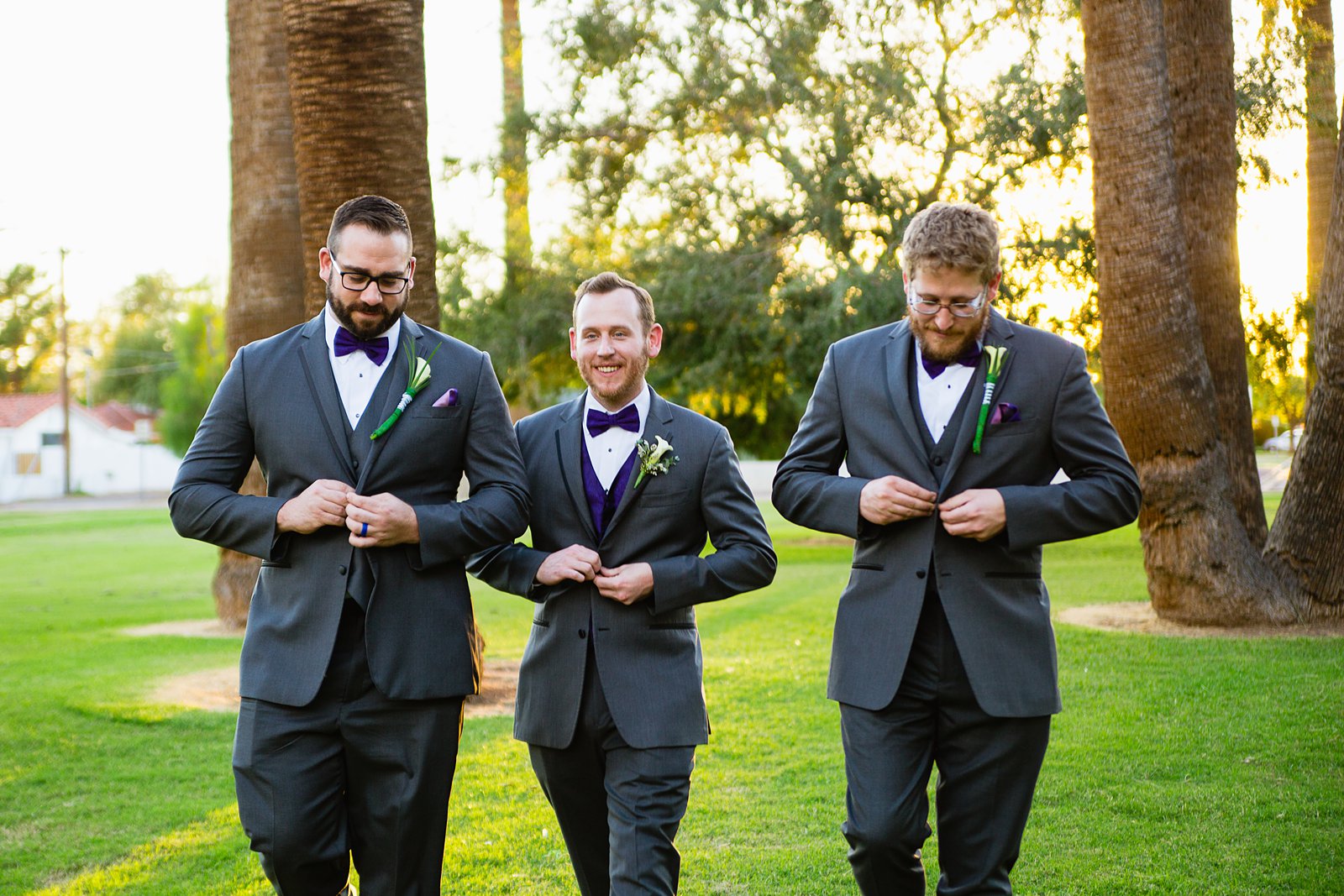 Groom and groomsmen together at a Encanto Park wedding by Arizona wedding photographer PMA Photography.