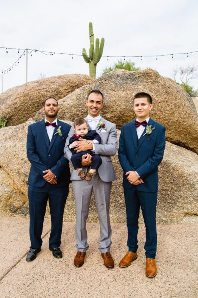 Groom and groomsmen together at a Troon North wedding by Arizona wedding photographer PMA Photography.