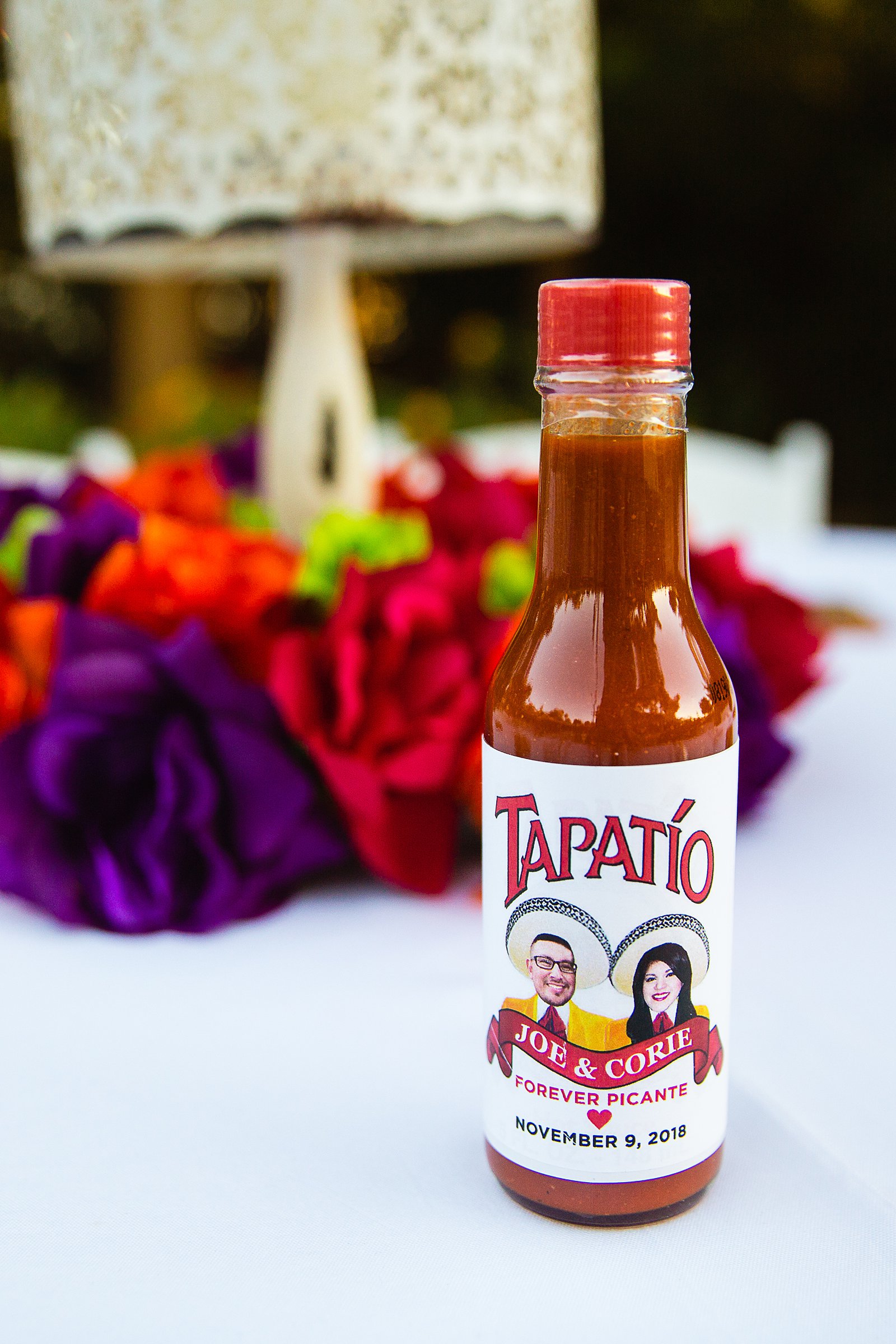 Custom Tapatio sauce at fiesta wedding reception by Arizona wedding photographer PMA Photography.