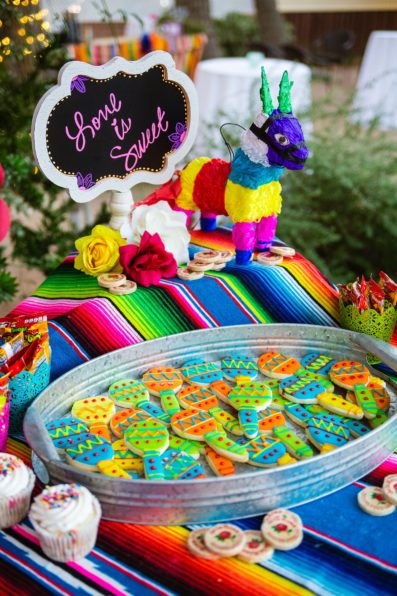Colorful fiesta sugar cookies on desert table by PMA Photography.