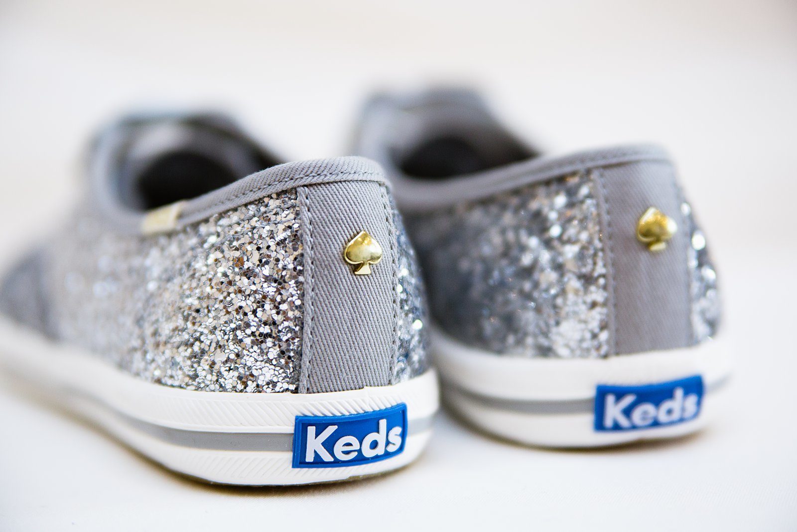 Bride's sparkly Kate Spade Keds reception shoes by PMA Photography.