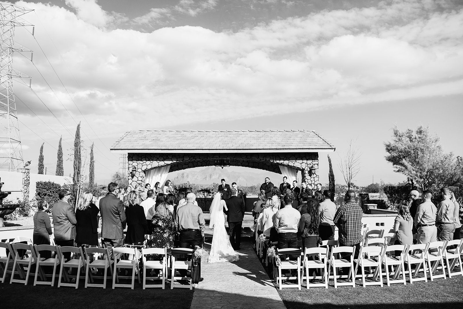 Wedding ceremony at Superstition Manor by Arizona wedding photographer PMA Photography.