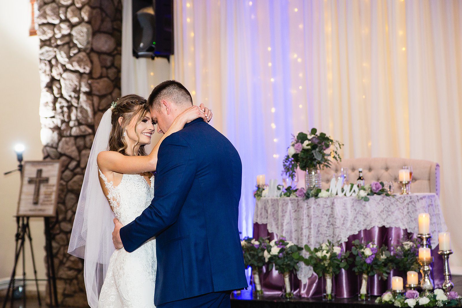 Bride and Groom sharing first dance at their Superstition Manor wedding reception by Arizona wedding photographer PMA Photography.