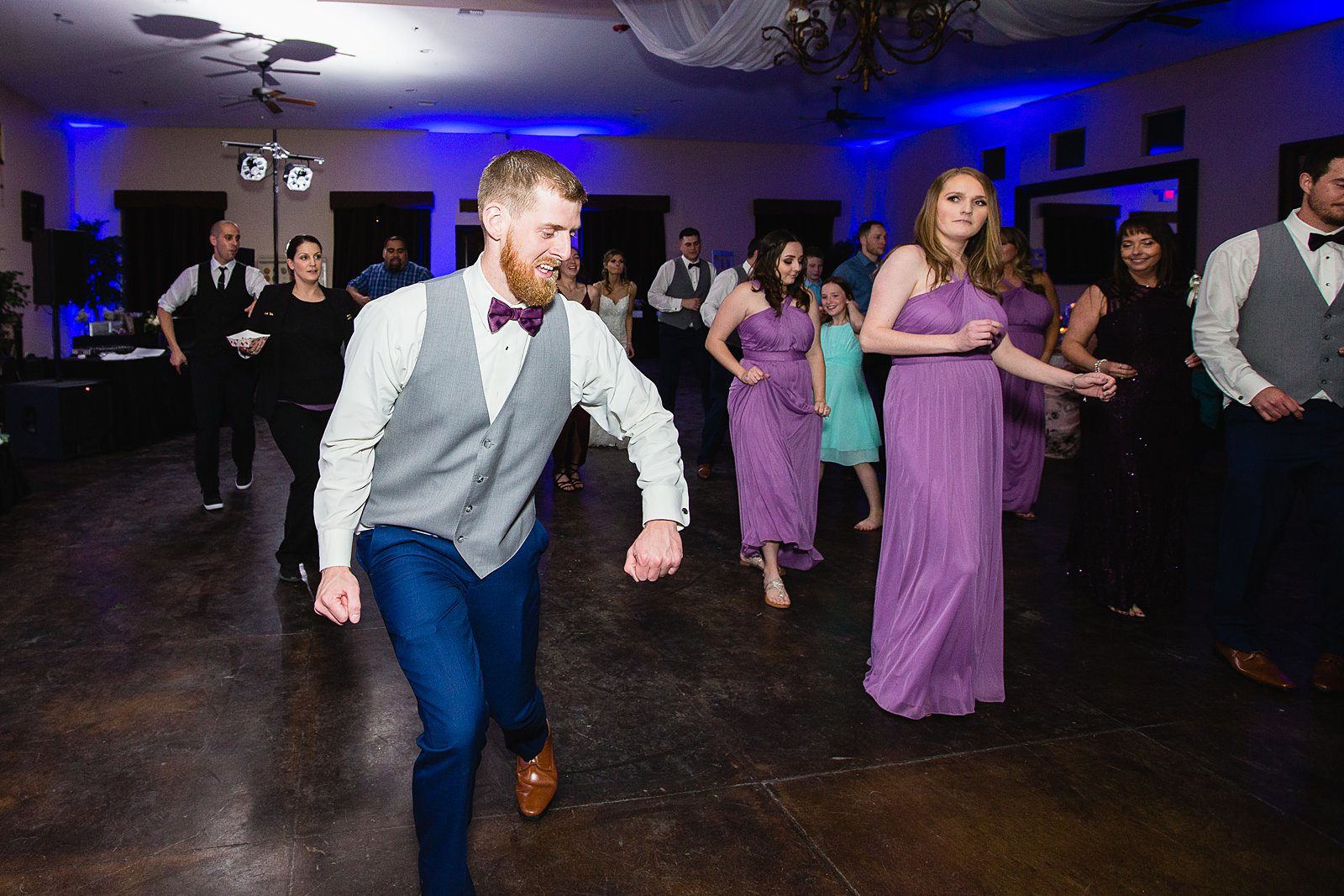 Guests dancing at a Superstition Manor wedding by PMA Photography.