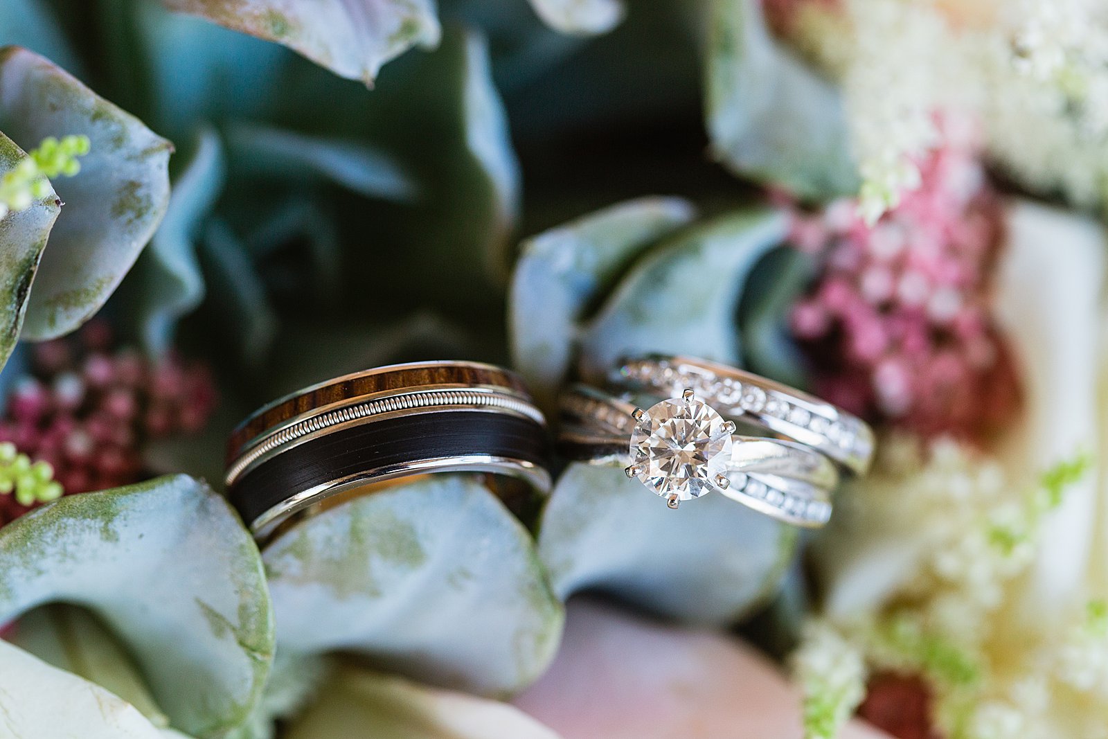 Bride and groom's simple unique wedding bands by PMA Photography.
