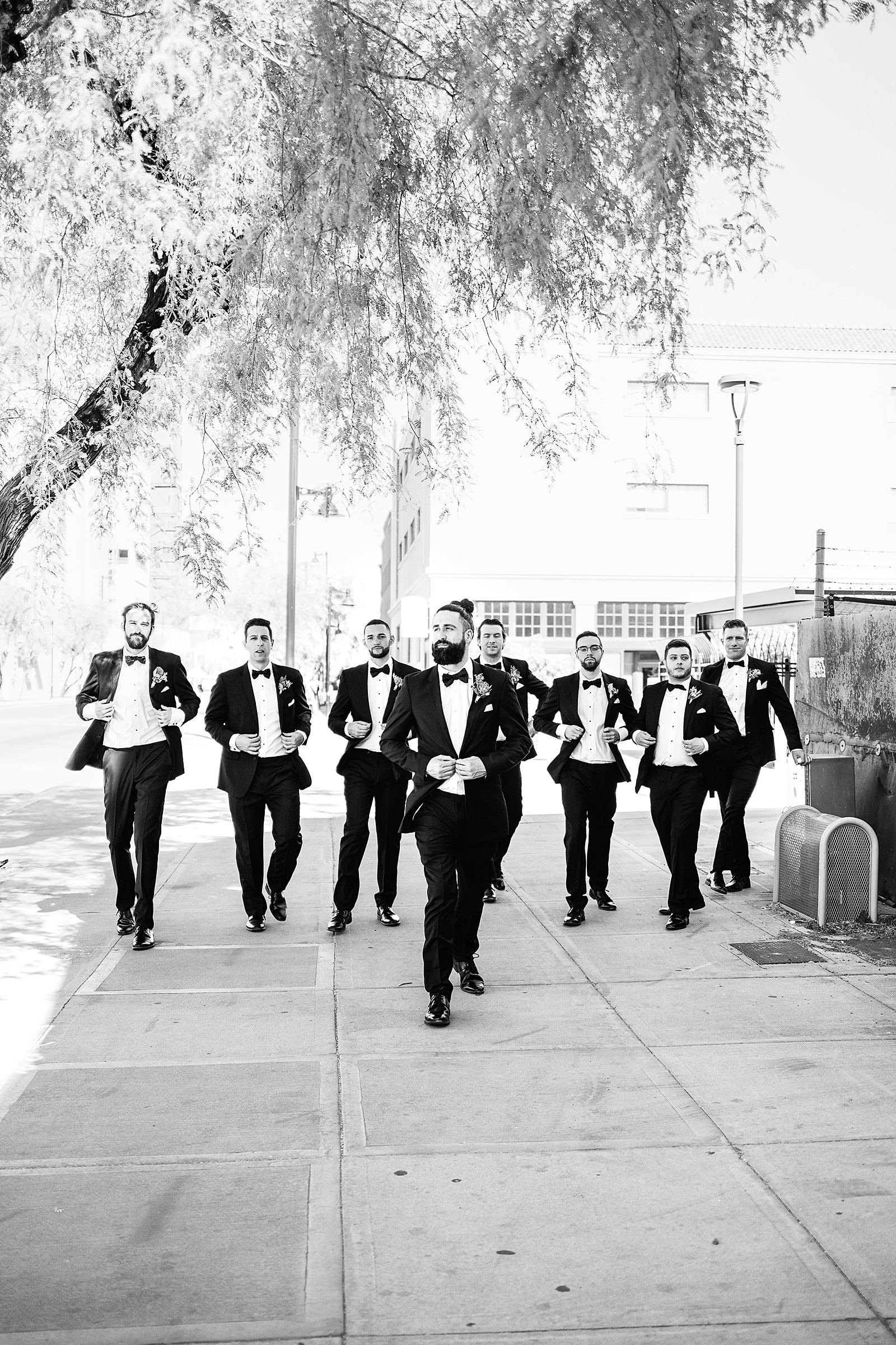 Groom and groomsmen together at a The Ice House wedding by Arizona wedding photographer PMA Photography.