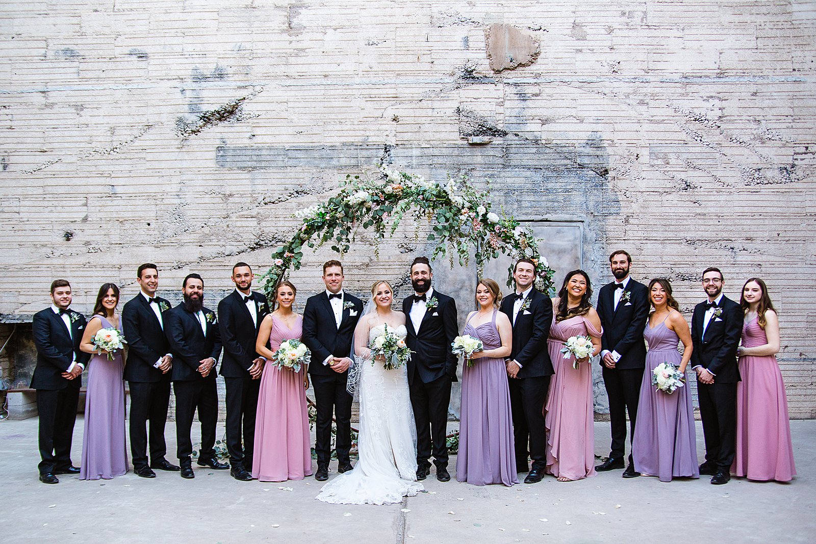 Bridal party together at a The Ice House wedding by Arizona wedding photographer PMA Photography.