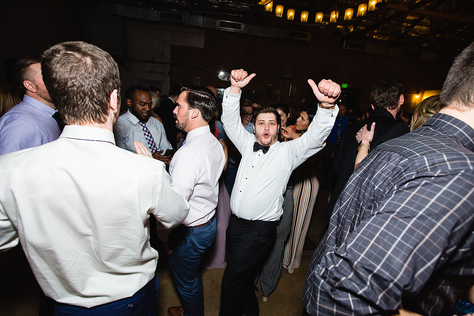 Guests dancing at The Ice House wedding reception by Phoenix wedding photographer PMA Photography