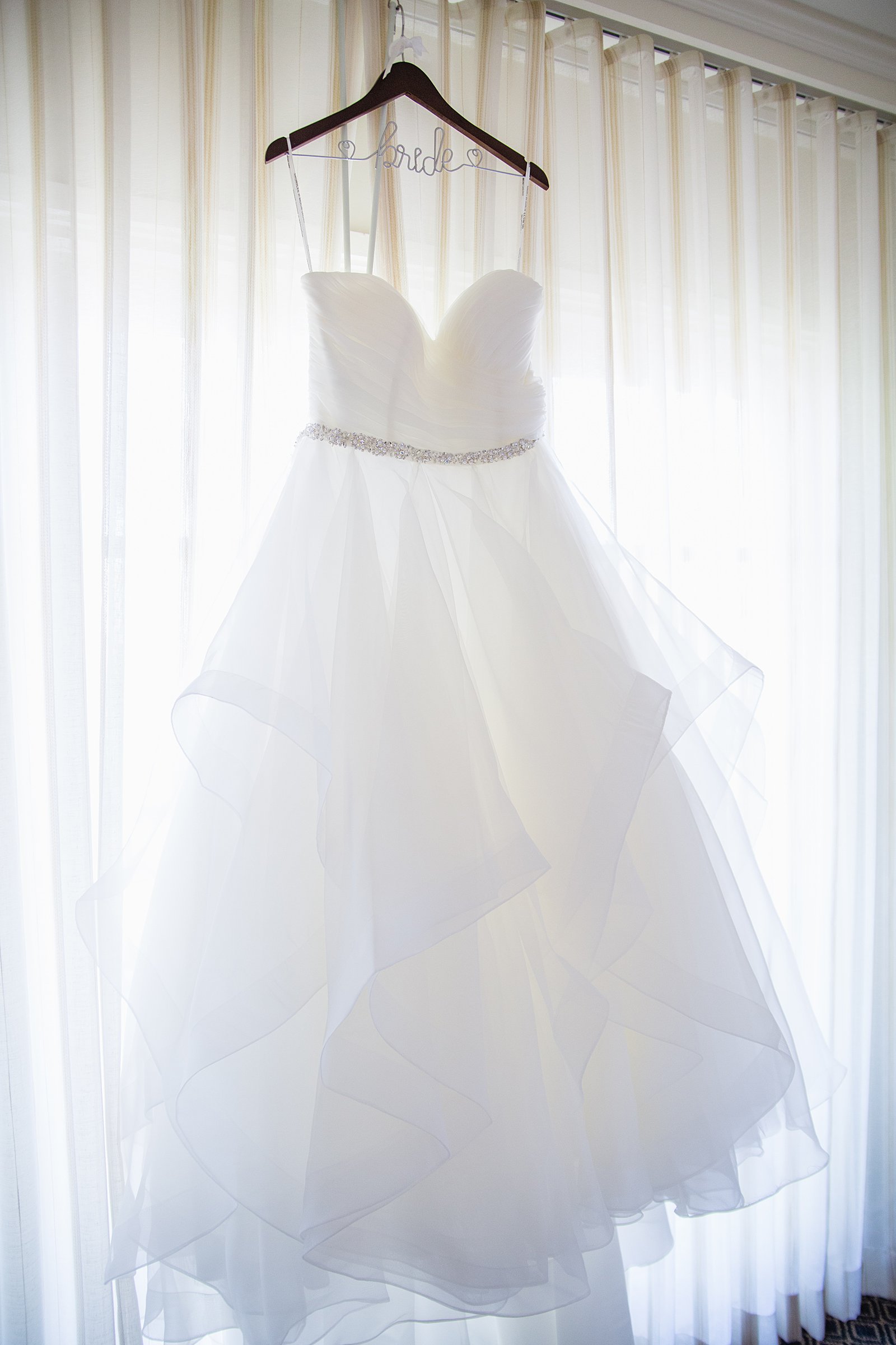 Bride's classic wedding dress for her Arizona Grand Resort wedding by PMA Photography.