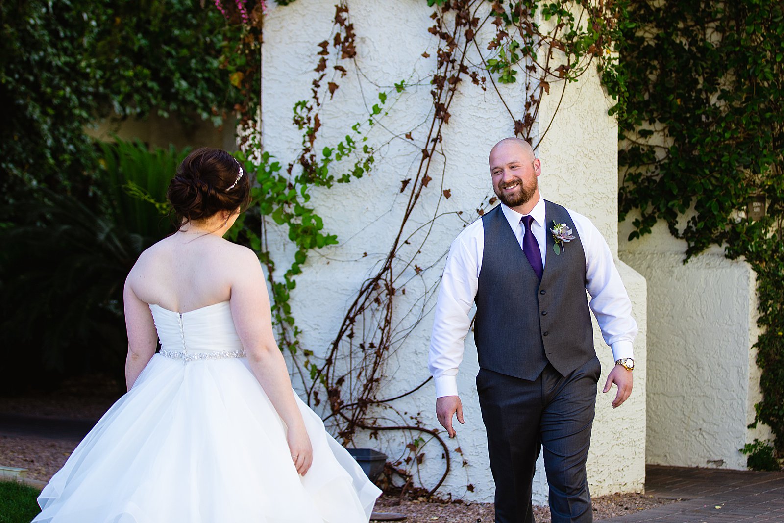Bride and Groom's first look at Arizona Grand Resort by Phoenix wedding photographer PMA Photography.