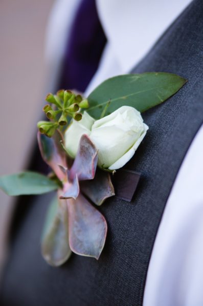 Groom's purple succulent boutonniere by PMA Photography.