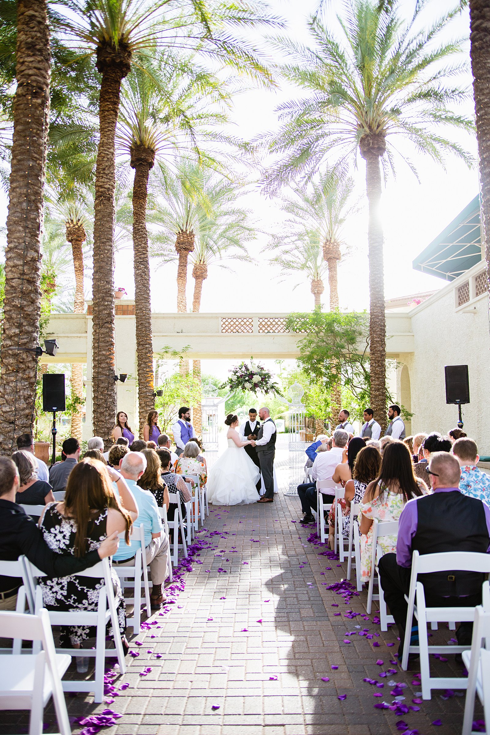 Wedding ceremony at Arizona Grand Resort by Phoenix wedding photographer PMA Photography.