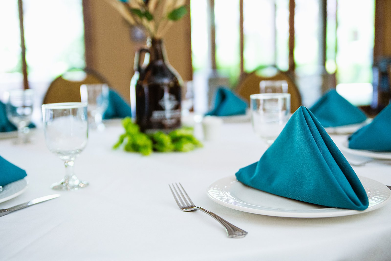 Turquoise wedding reception tables by PMA Photography.