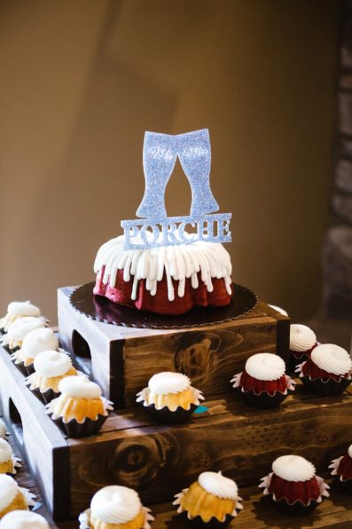 Wedding bunt cake with brewery inspired cake topper by Arizona wedding photographer PMA Photography.