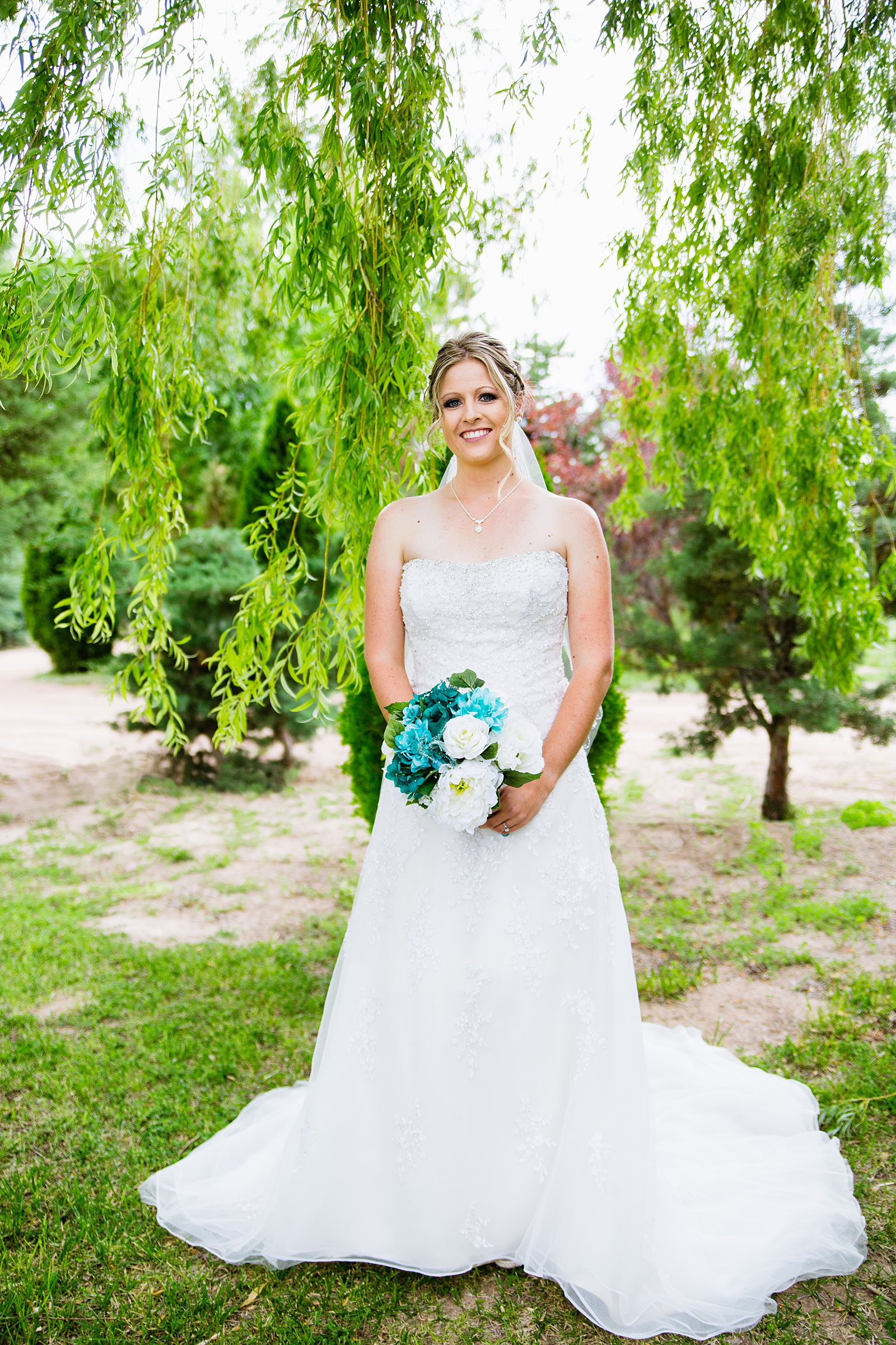 Bride's simple, classic wedding dress for her The Windmill House wedding by PMA Photography.