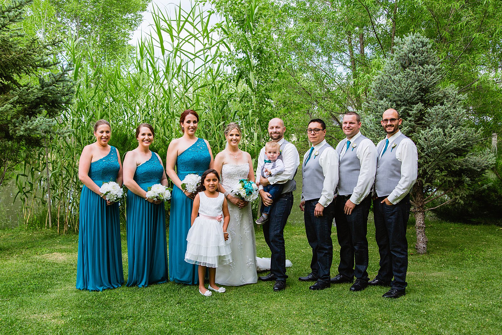Bridal party together at a The Windmill House wedding by Arizona wedding photographer PMA Photography.