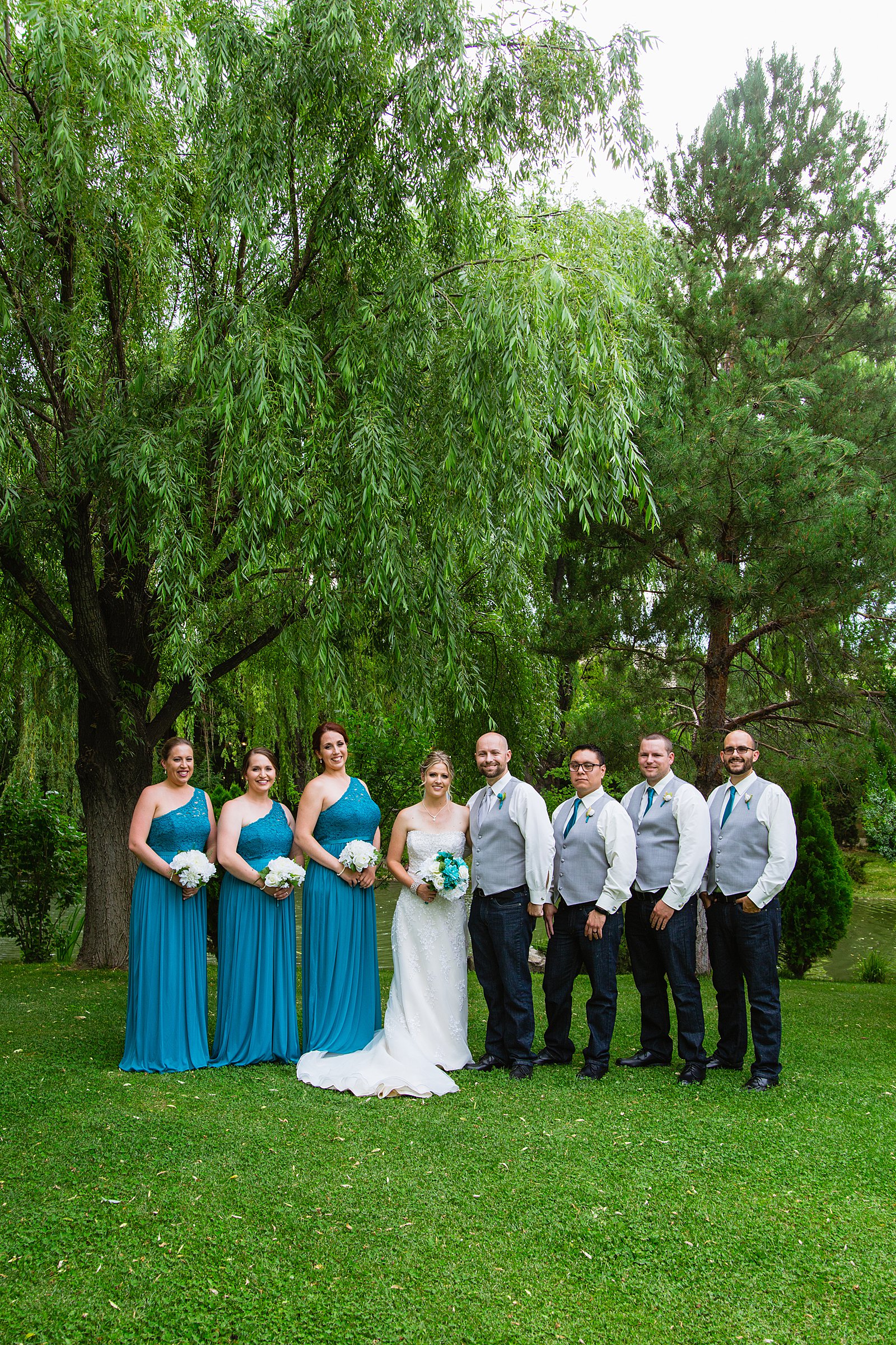Bridal party together at a The Windmill House wedding by Arizona wedding photographer PMA Photography.