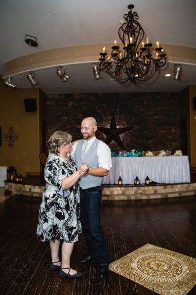 Groom dancing with guests at The Windmill House wedding reception by Chino Valley wedding photographer PMA Photography
