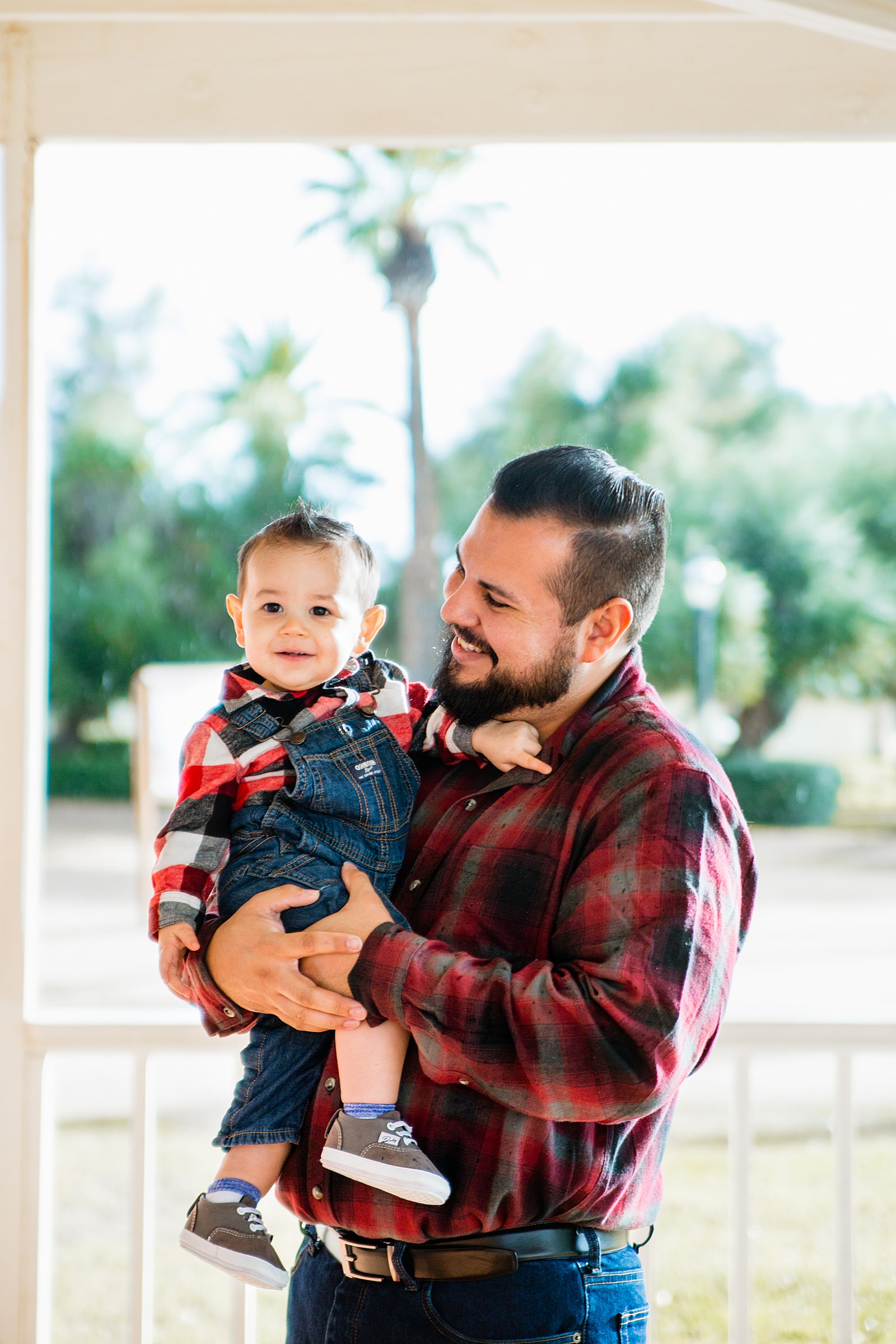 Dad and baby boy during their fall family session at Sahuaro Ranch by phoenix family photographer PMA Photography.