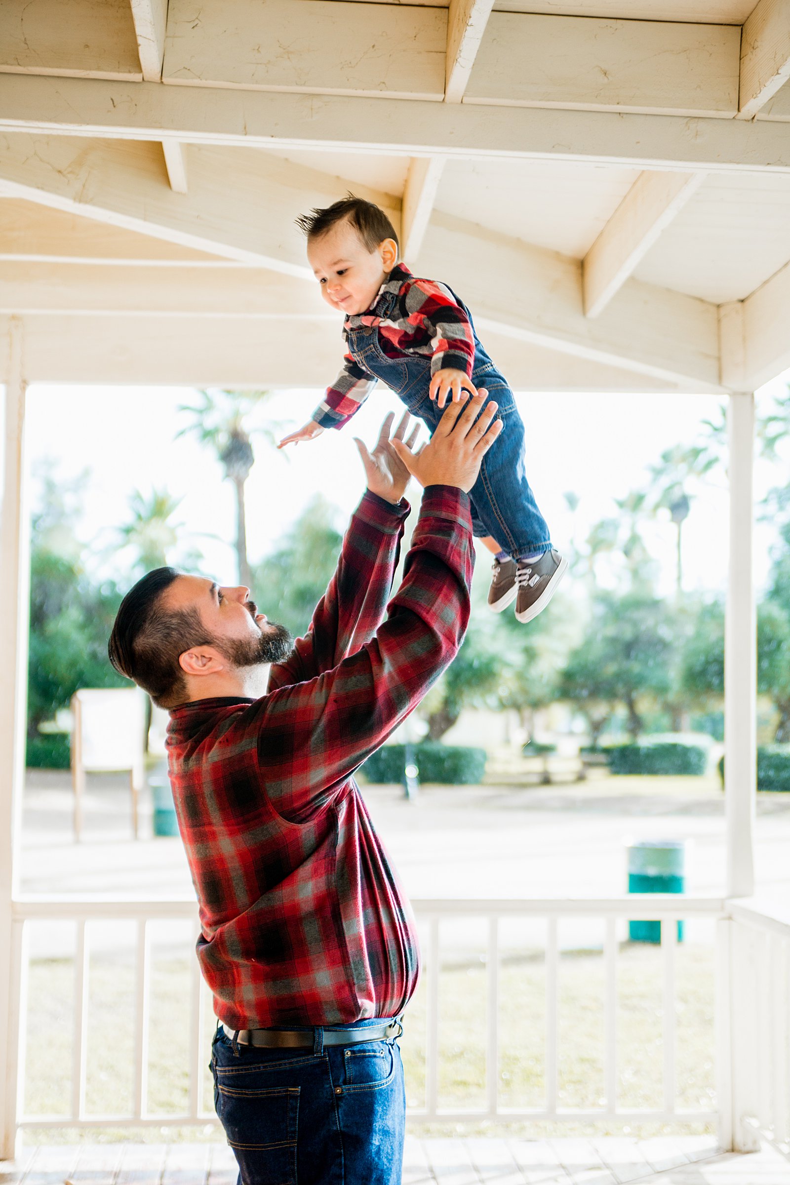 Dad and baby boy during their fall family session at Sahuaro Ranch by phoenix family photographer PMA Photography.