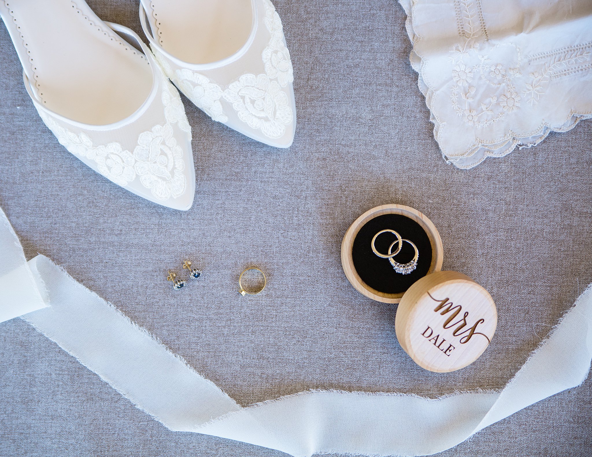 Bride's wedding day details with custom mrs ring box by PMA Photography.
