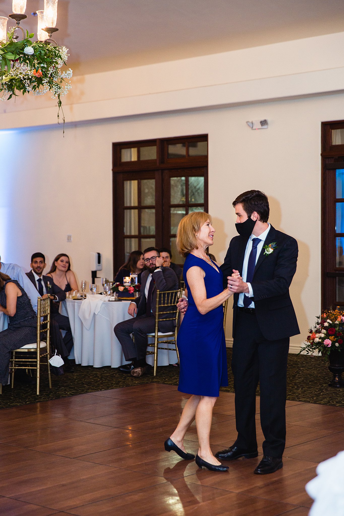Groom dancing with his mother at Secret Garden Events wedding reception by Phoenix wedding photographer PMA Photography