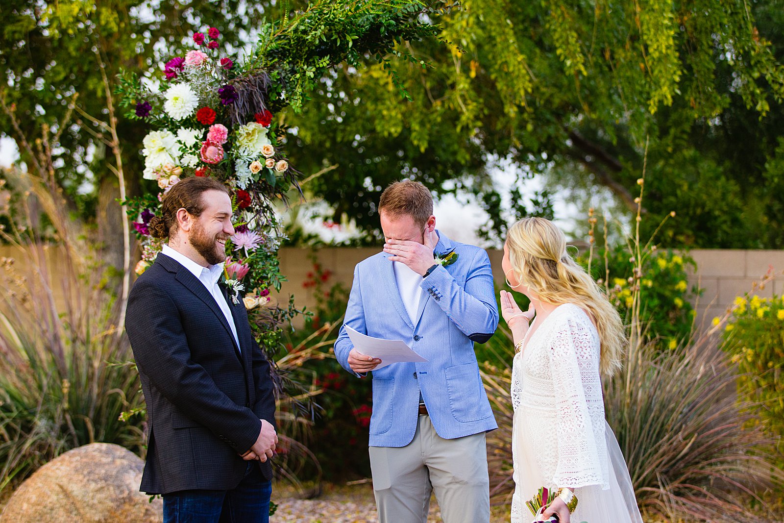 Wedding ceremony at Backyard by Phoenix wedding photographer PMA Photography.