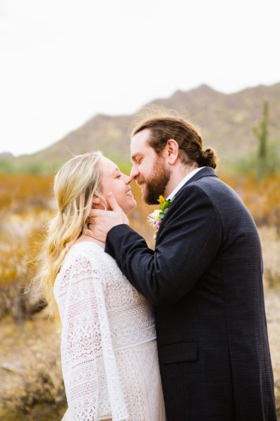 Bride and Groom share an intimate moment during their San Tan Regional Park wedding by Phoenix wedding photographer PMA Photography.