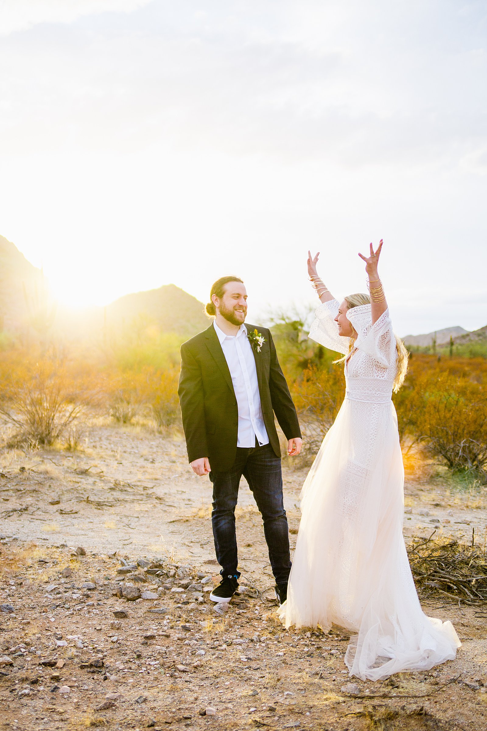 Bride and Groom dancingtogether during their San Tan Regional Park wedding by Arizona wedding photographer PMA Photography.