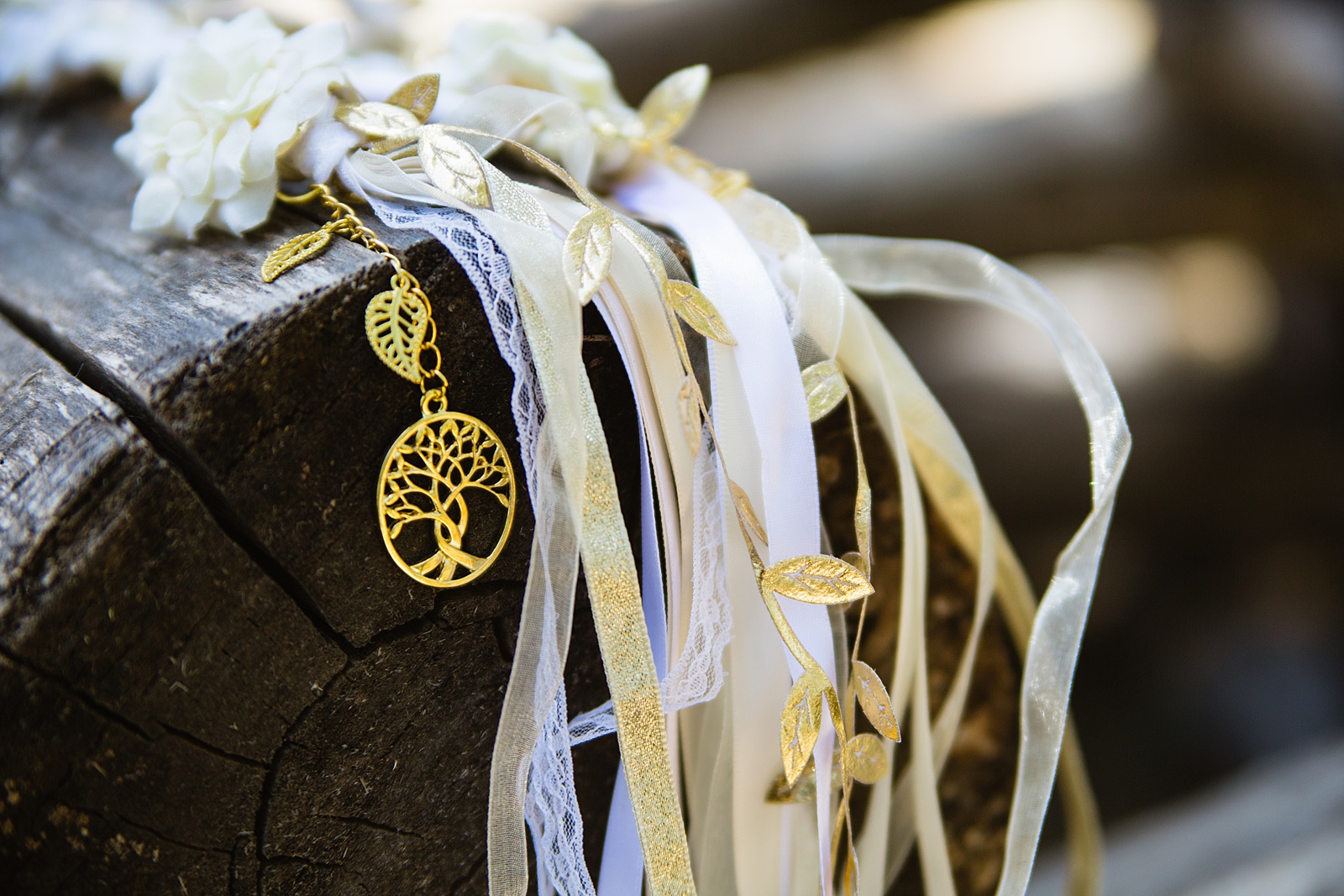 Gold and white handfasting chords with leaf and tree charms by Arizona wedding photographer PMA Photography.