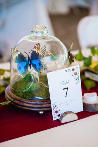 Fairytale inspired wedding centerpieces at Arizona Nordic Village wedding reception by Flagstaff wedding photographer PMA Photography.