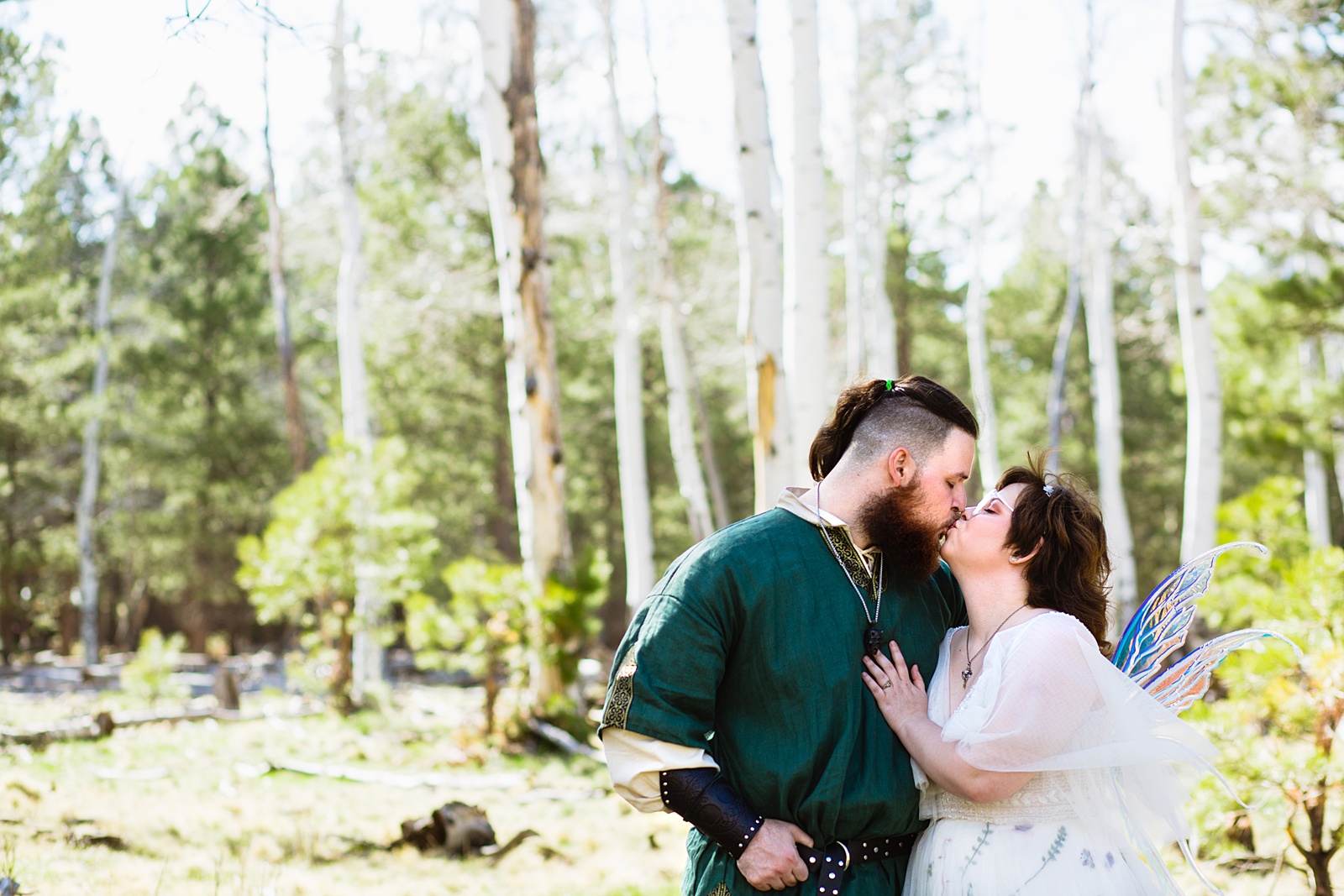 Newlyweds share an intimate moment at their Arizona Nordic Village wedding by Arizona wedding photographer PMA Photography.
