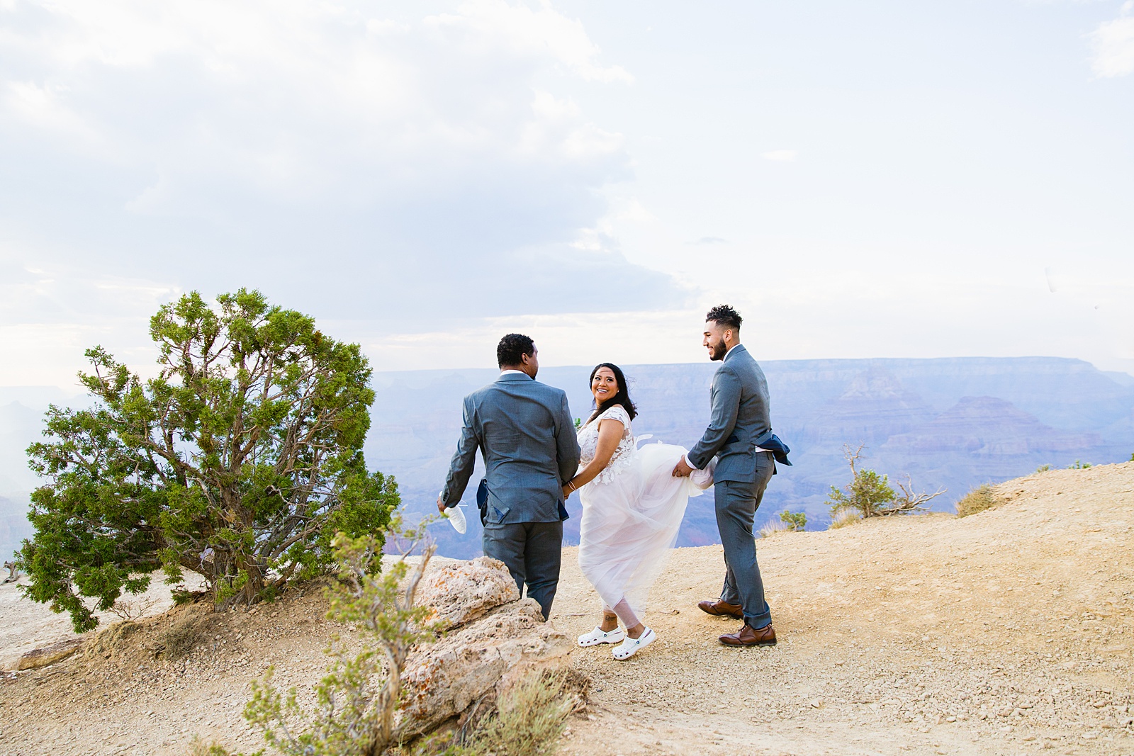 Bride walking to the ceremony space at her Grand Canyon elopement by Arizona elopement photographer PMA Photography.