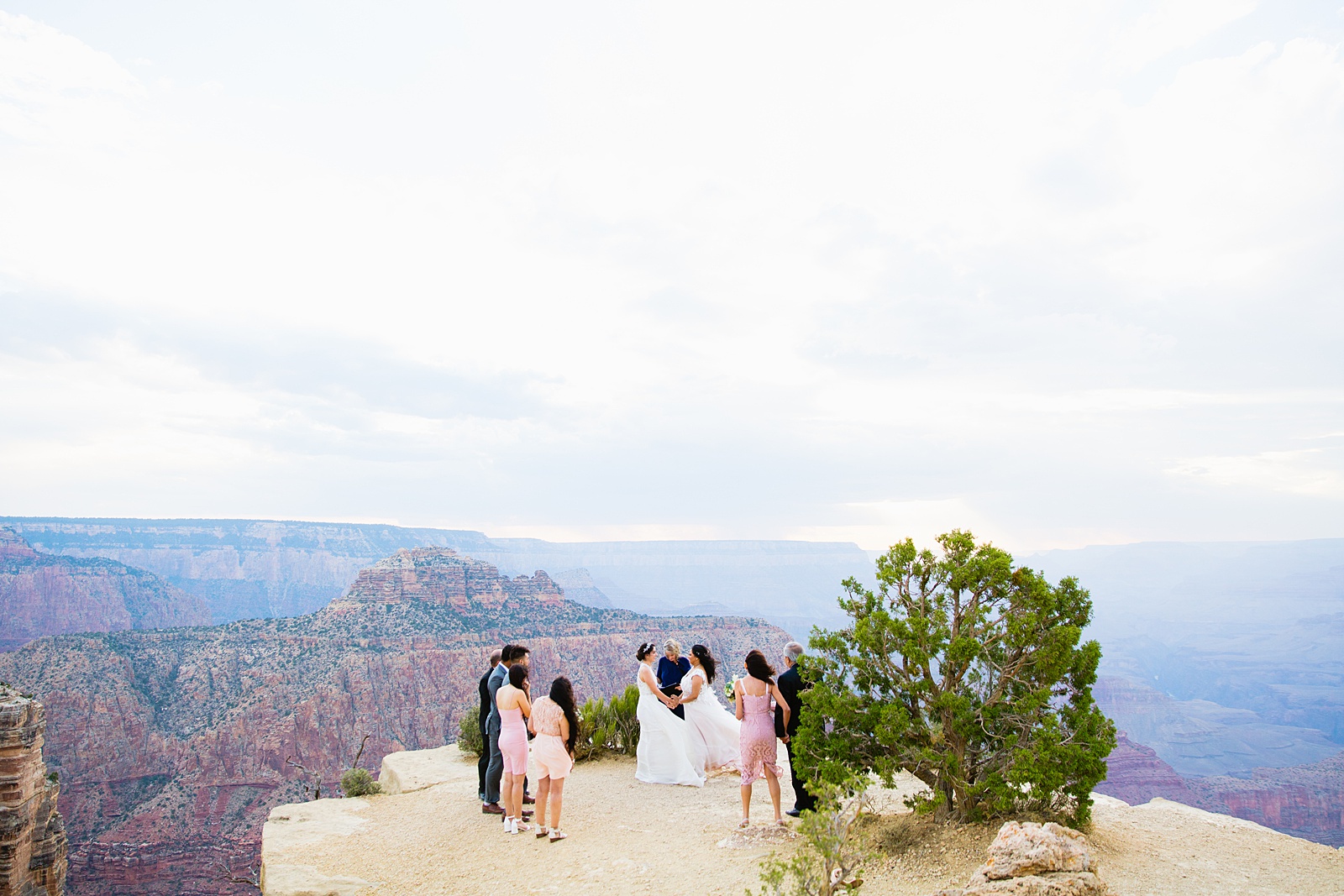Lesbian wedding ceremony at Moran Point, Grand Canyon by Arizona elopement photographer PMA Photography.