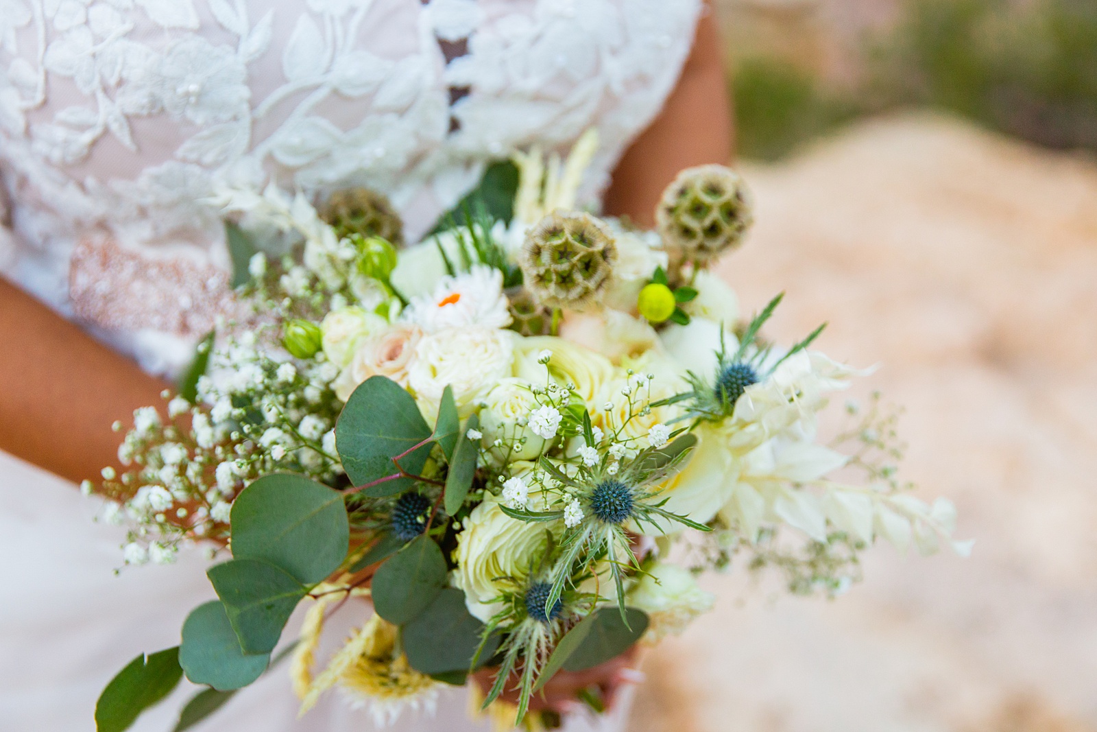 Bride's white neutrals wedding bouquet by PMA Photography.