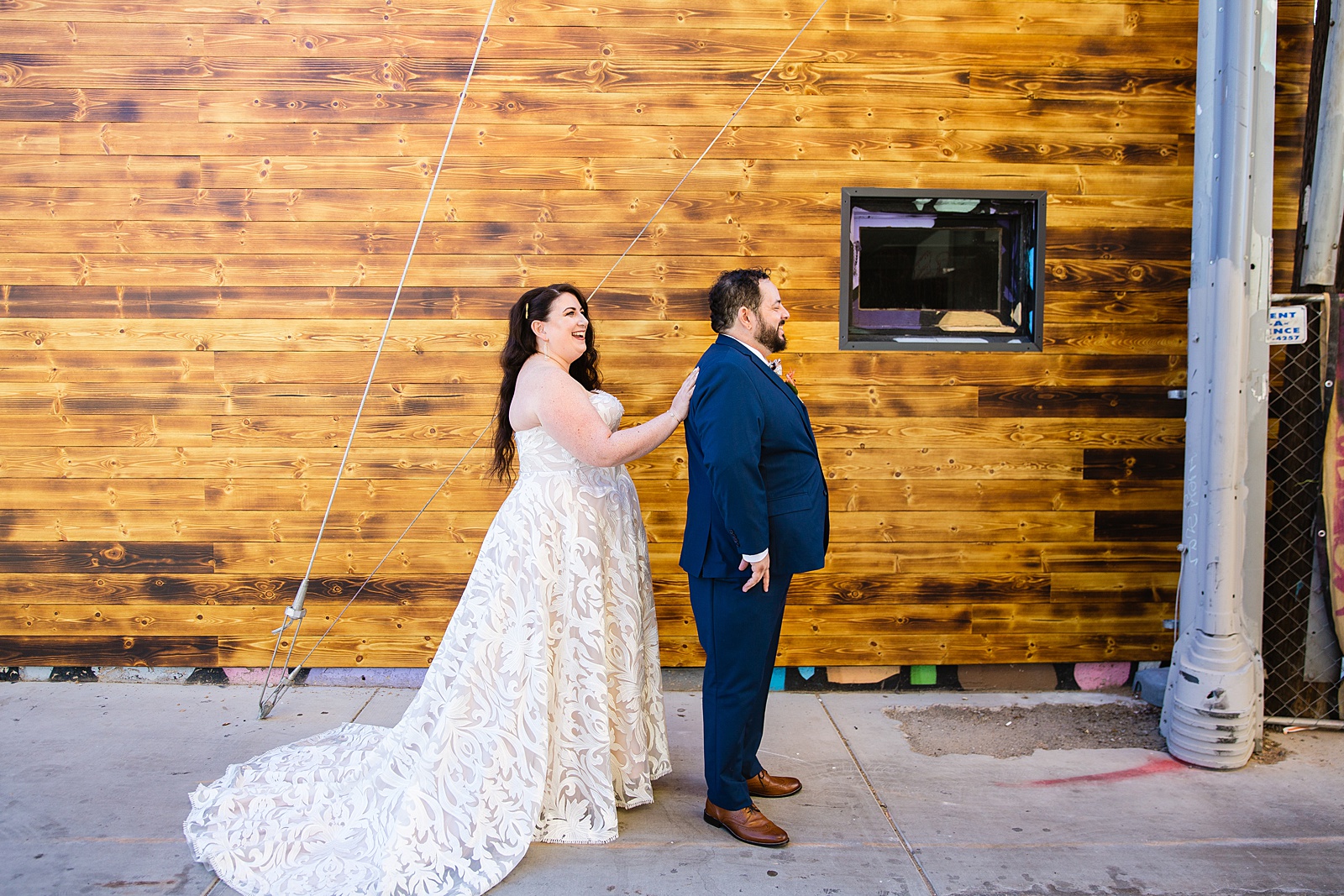 Bride and Groom's first look at MonOrchid by Phoenix wedding photographer PMA Photography.